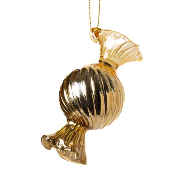 Apvalus auksinis saldainis